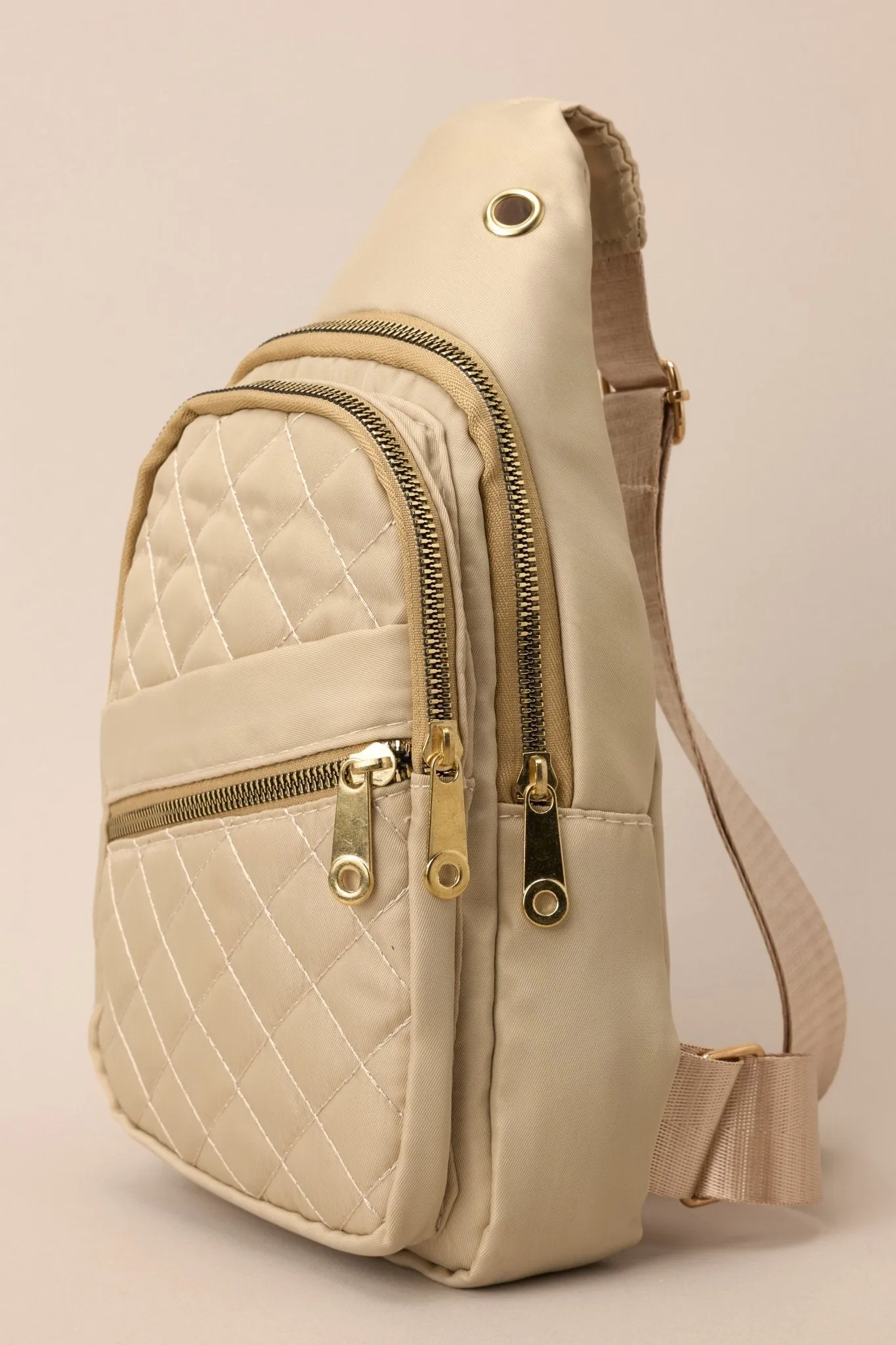 First In Line Beige Quilted Sling Bag