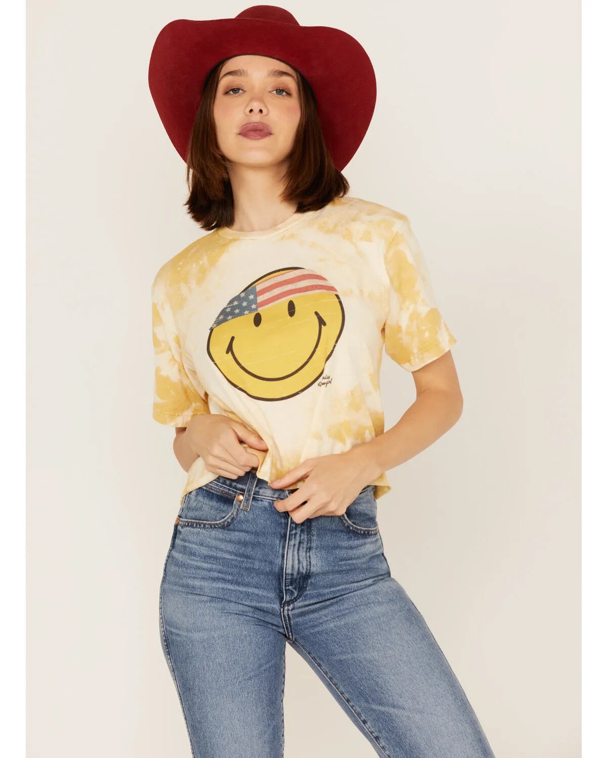 Product Name:  Bohemian Cowgirl Women's Boot Barn Exclusive Americana Smiley Face Graphic Bleach Spray Tee