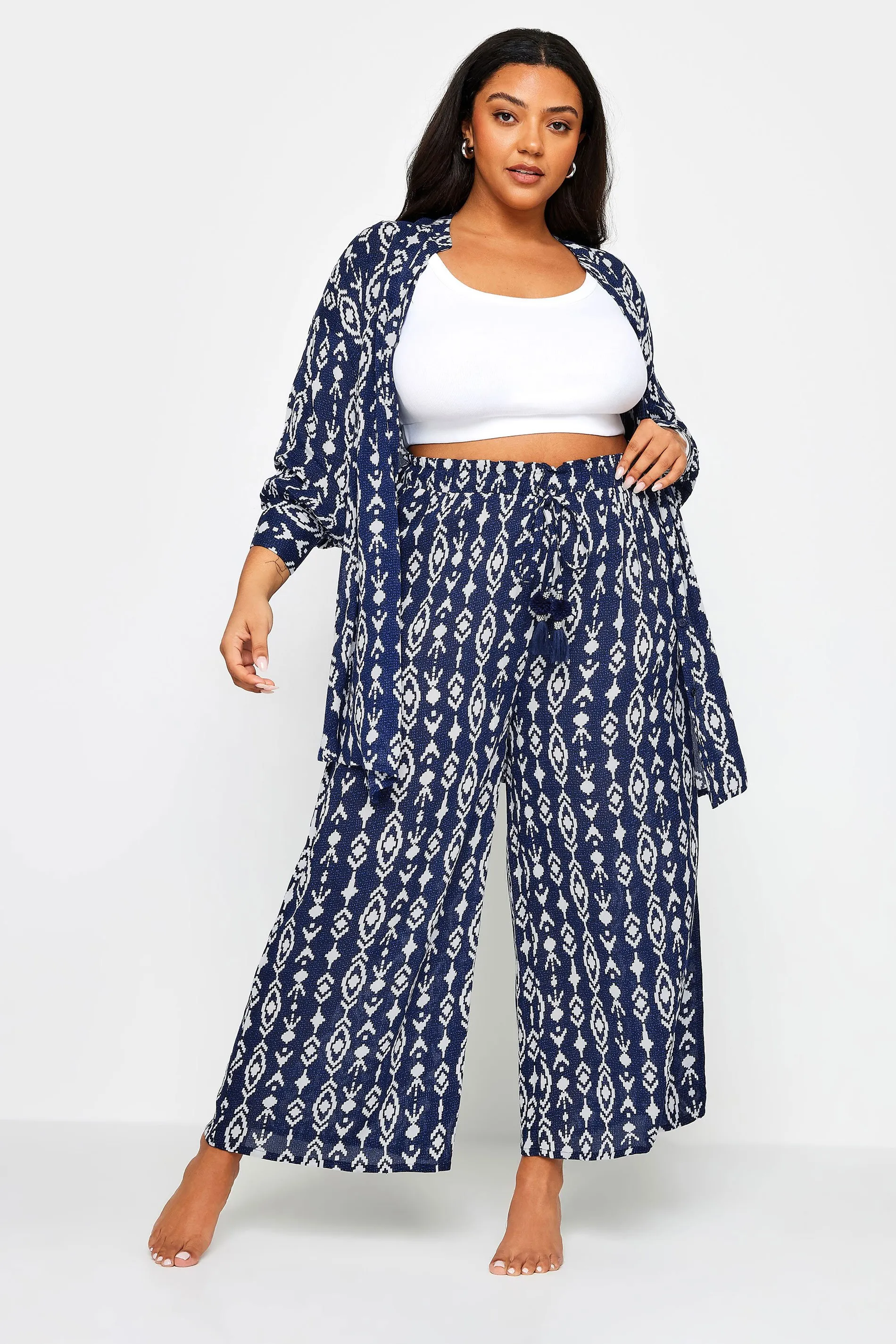 YOURS Curve Navy Blue Ikat Print Crinkle Tassel Trousers